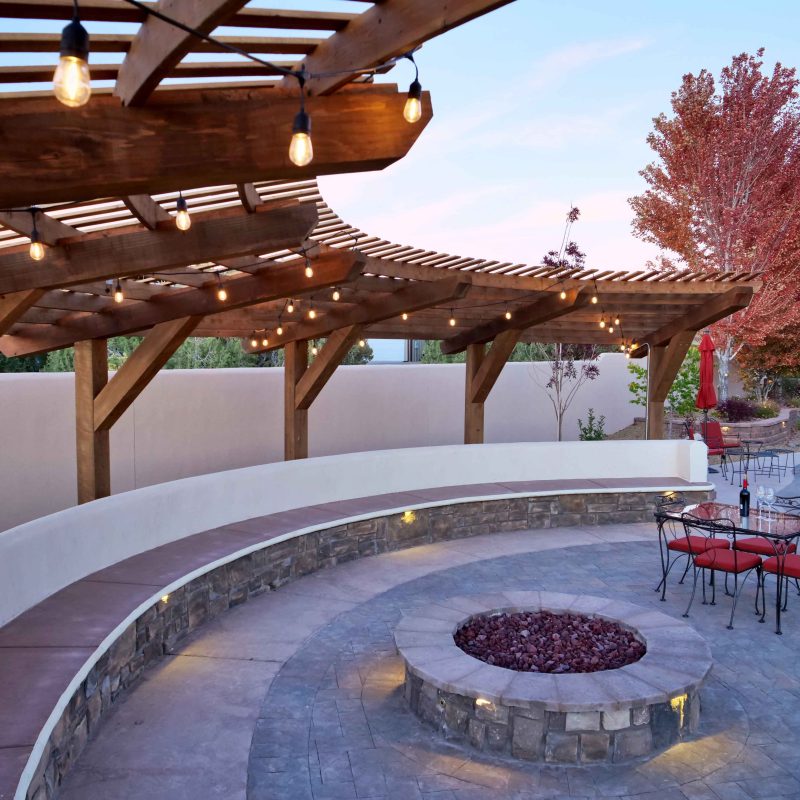 Curved redwood pergola shade structure in Farmington, New Mexico.