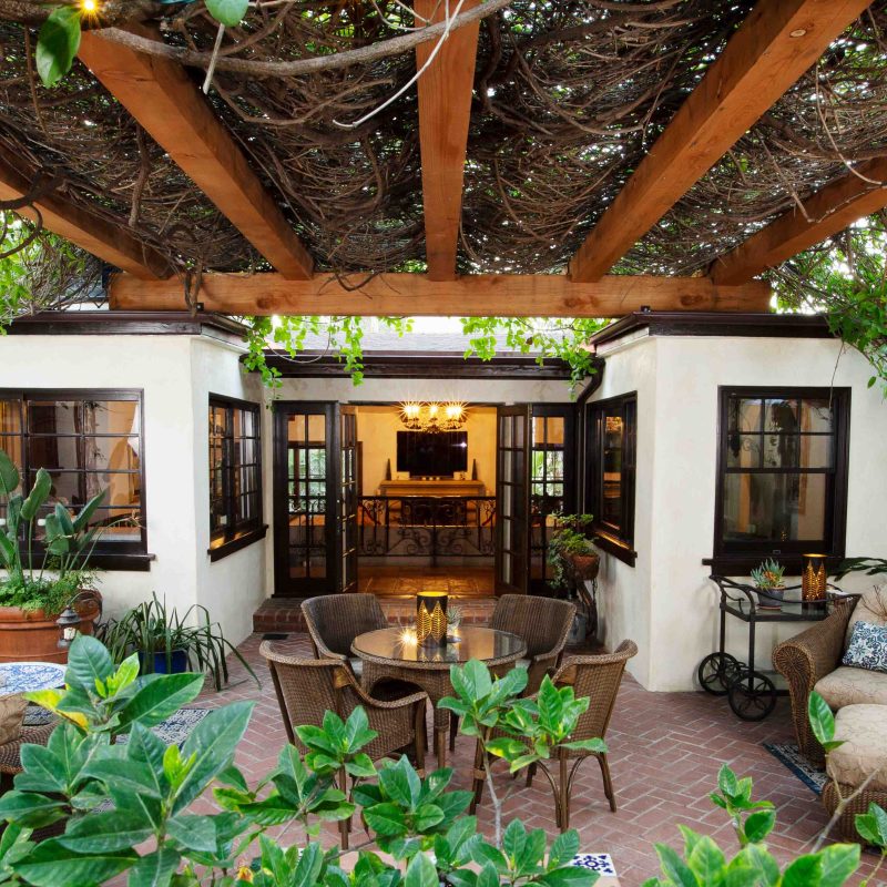 Nestled in the Hollywood Hills, the Rancho-style home first built in 1925 had seen a number of changes over the years. It's most recent remodel saw the removal of an old Douglas-fir shade structure, replaced with redwood.